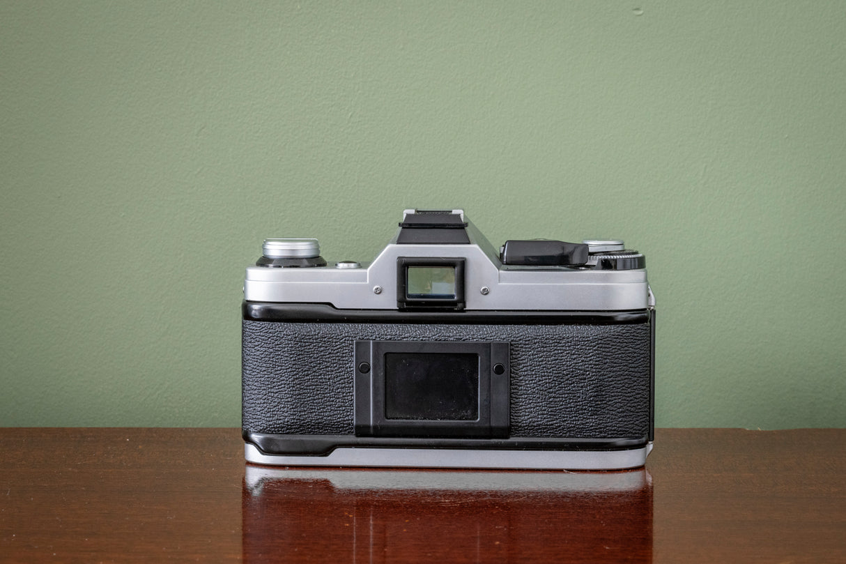 Gorgeous Canon AE1 35mm SLR Film Camera + Canon 50mm F1.8 FD Lens - Silver