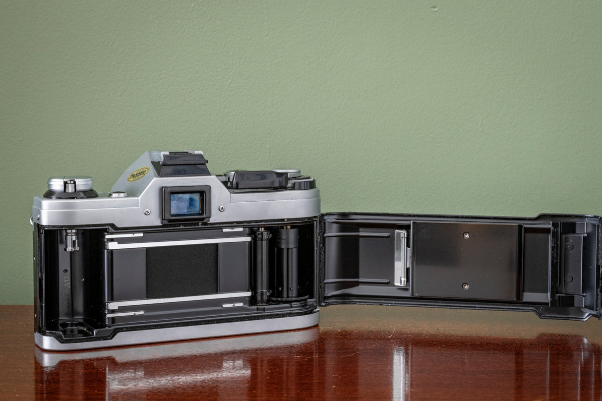 Gorgeous Canon AE1 35mm SLR Film Camera + Canon 50mm F1.8 FD Lens - Silver