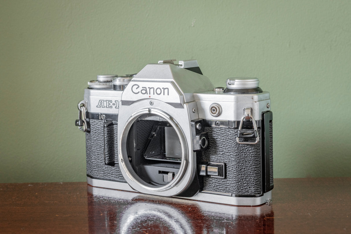 Canon AE1 35mm SLR Film Camera with Vivitar Auto Wide 28mm F2.5 Lens + Vivitar 70-210 F3.5 Lens