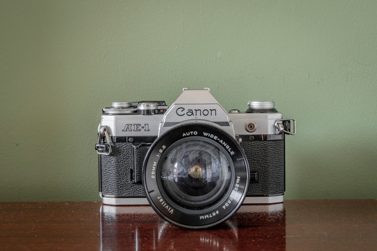 Canon AE1 35mm SLR Film Camera with Vivitar Auto Wide 28mm F2.5 Lens + Vivitar 70-210 F3.5 Lens