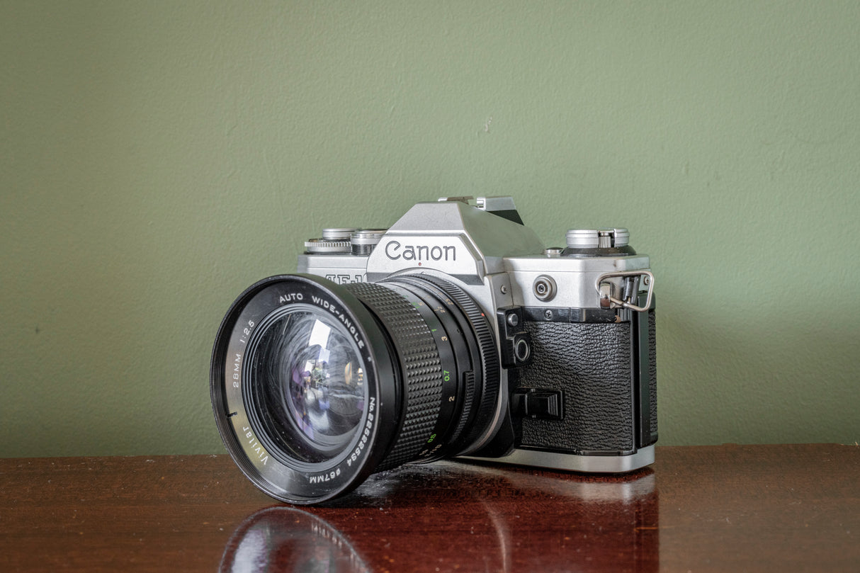 Canon AE1 35mm SLR Film Camera with Vivitar Auto Wide 28mm F2.5 Lens + Vivitar 70-210 F3.5 Lens