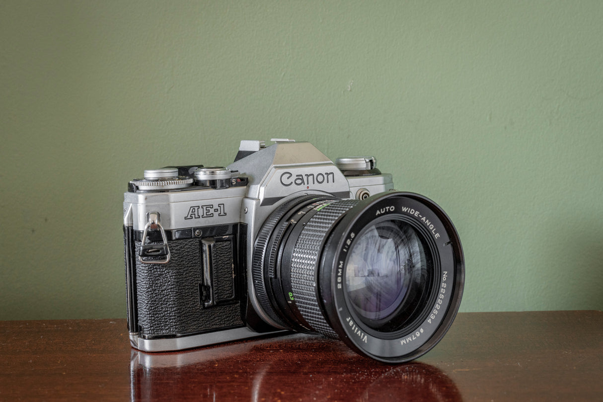 Canon AE1 35mm SLR Film Camera with Vivitar Auto Wide 28mm F2.5 Lens + Vivitar 70-210 F3.5 Lens
