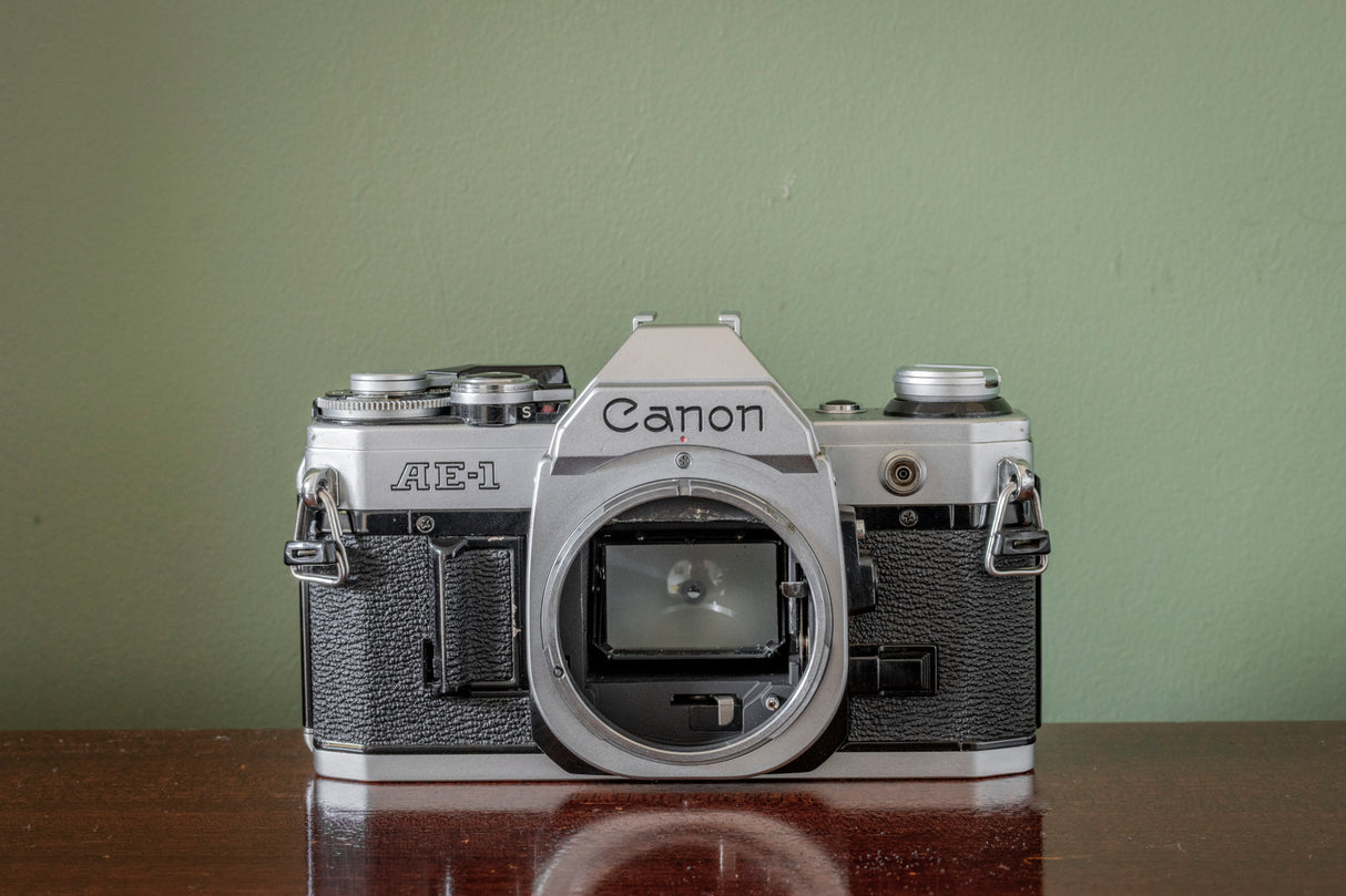 Canon AE1 35mm SLR Film Camera with Vivitar Auto Wide 28mm F2.5 Lens + Vivitar 70-210 F3.5 Lens