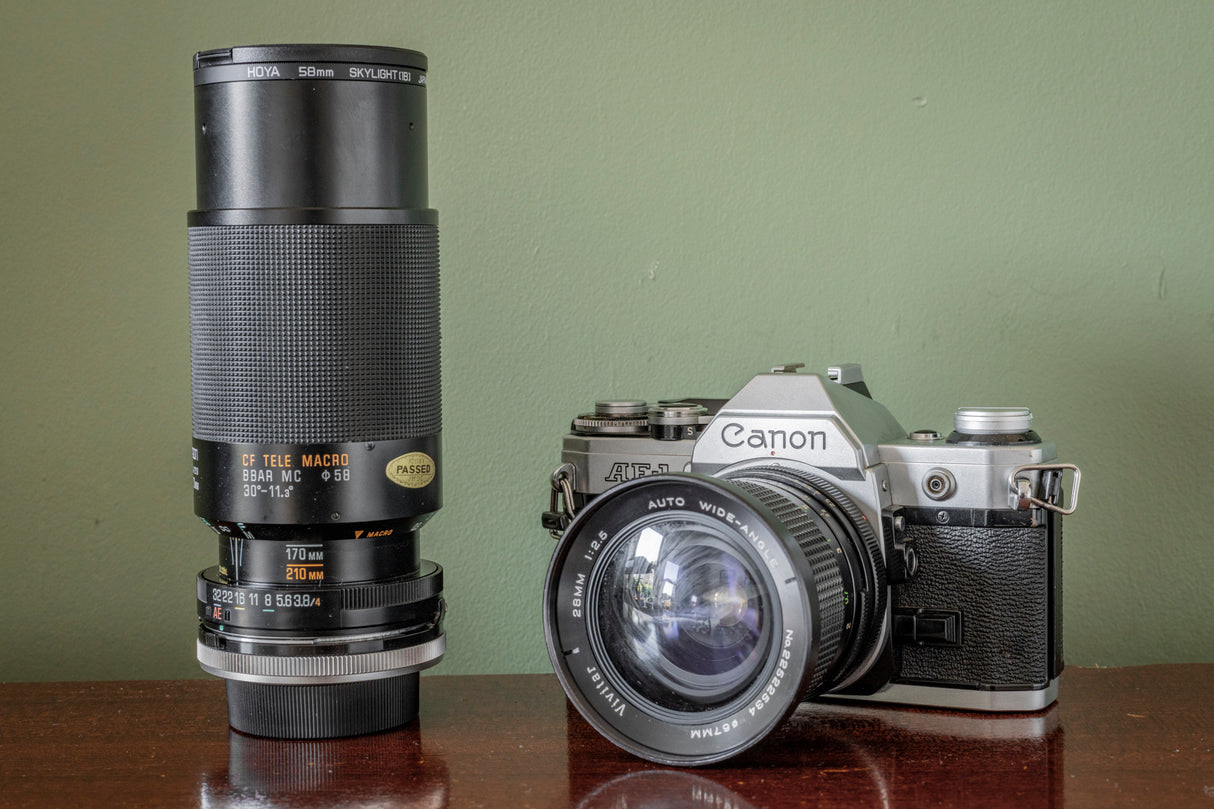 Canon AE1 35mm SLR Film Camera with Vivitar Auto Wide 28mm F2.5 Lens + Vivitar 70-210 F3.5 Lens