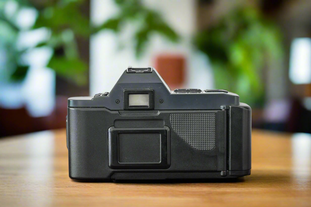 1980s Canon T70 35mm SLR Film Camera with Tokina 28-85mm Zoom Lens