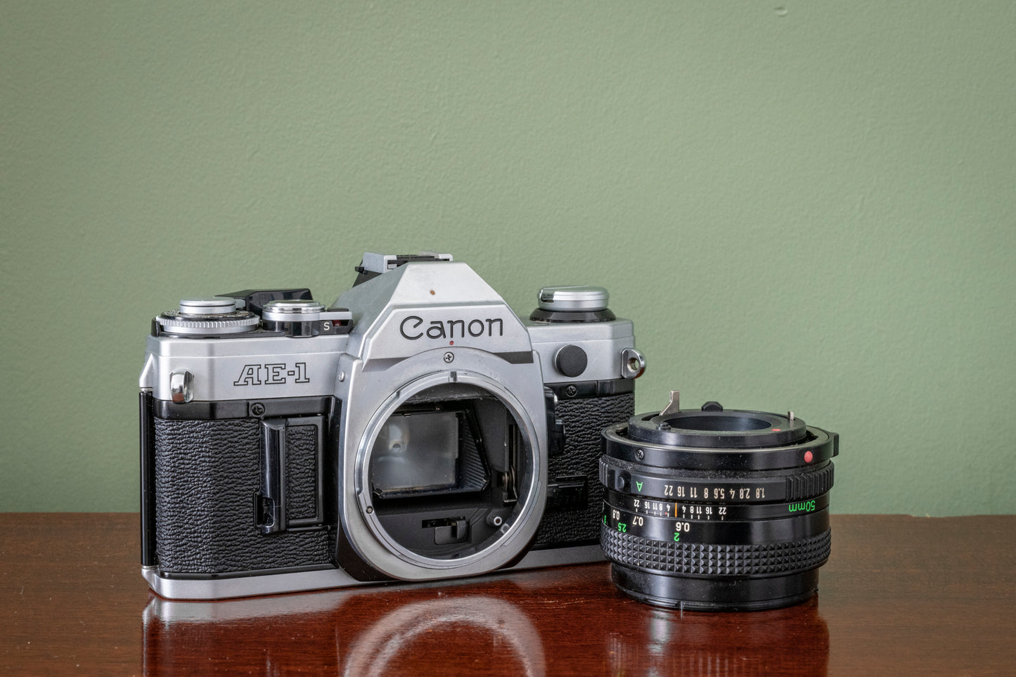 Gorgeous Canon AE1 35mm SLR Film Camera + Canon 50mm F1.8 FD Lens - Silver