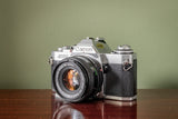 Canon AV-1 35mm SLR Film Camera + 50mm F1.8FD Canon Lens